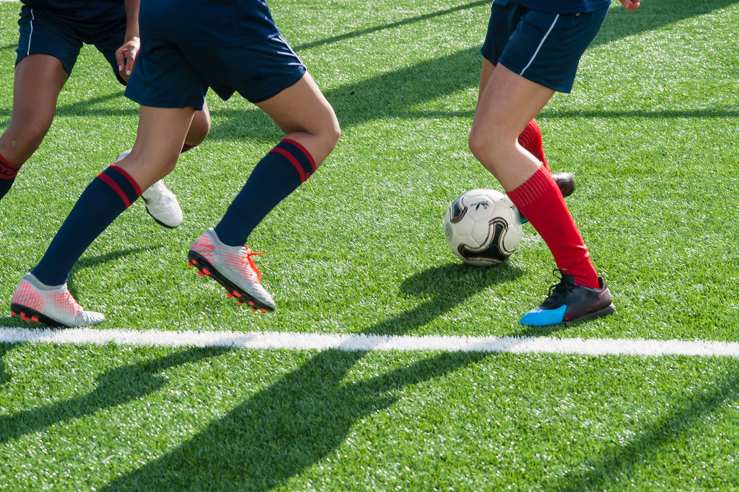 Athletes Playing Soccer in the Stadium